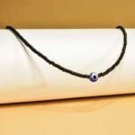 indiski-papuosalai-veriniai-is-karoliuku-verinys-su-pikta-akimi-juoda